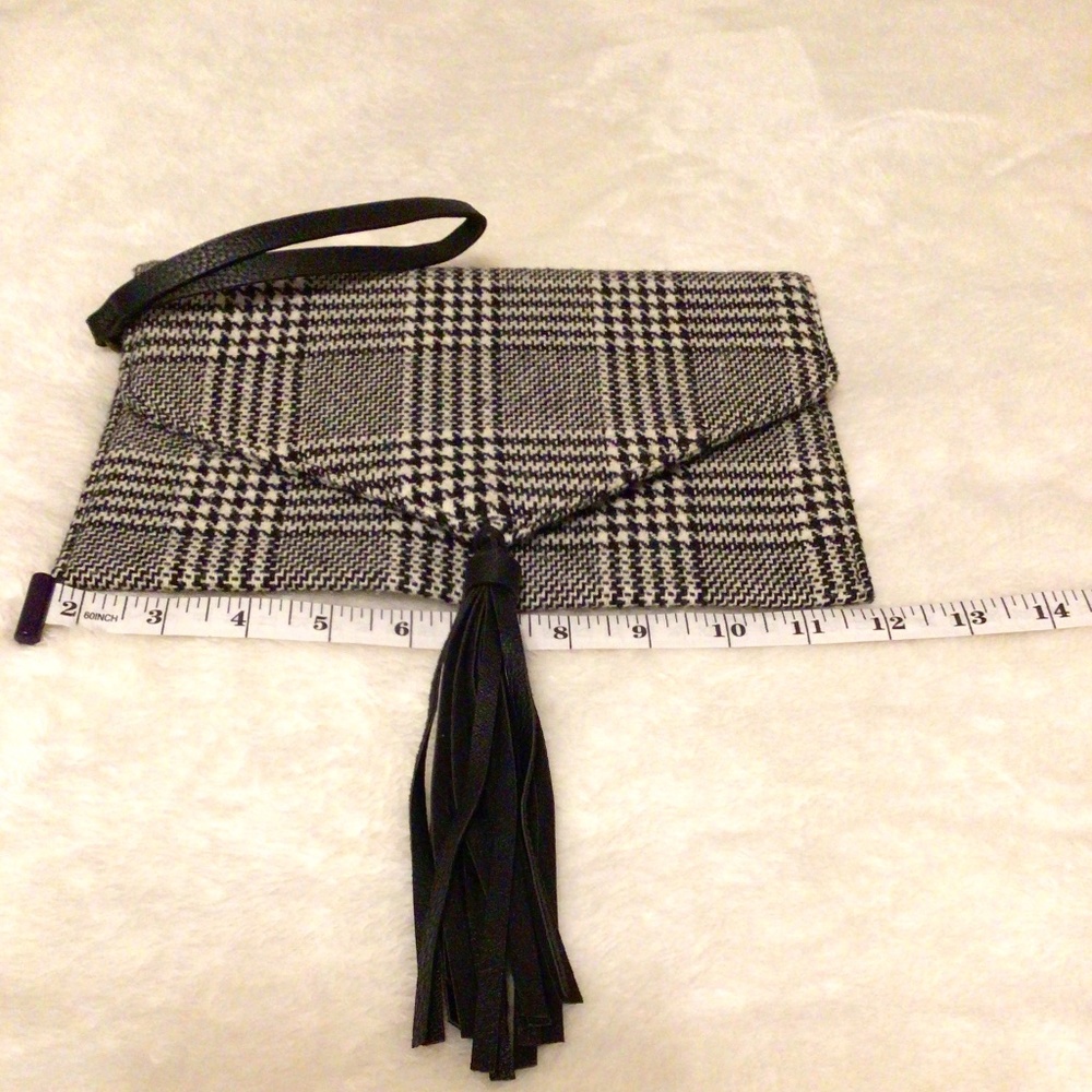 Carlos Santana clutch/ wristlet black and white
